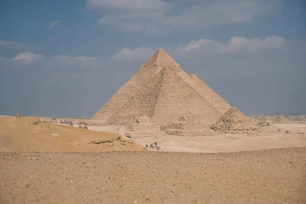 Stunning daytime view of the iconic Great Pyramid of Giza under a clear sky.
