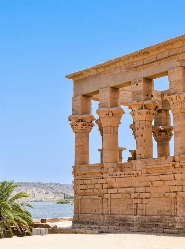 Explore the majestic ruins of an ancient temple by the Nile in Aswan, Egypt.