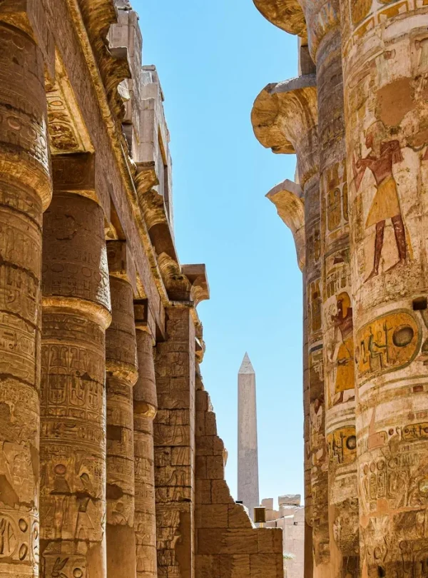 Explore the majestic columns and hieroglyphs at Karnak Temple in Egypt.